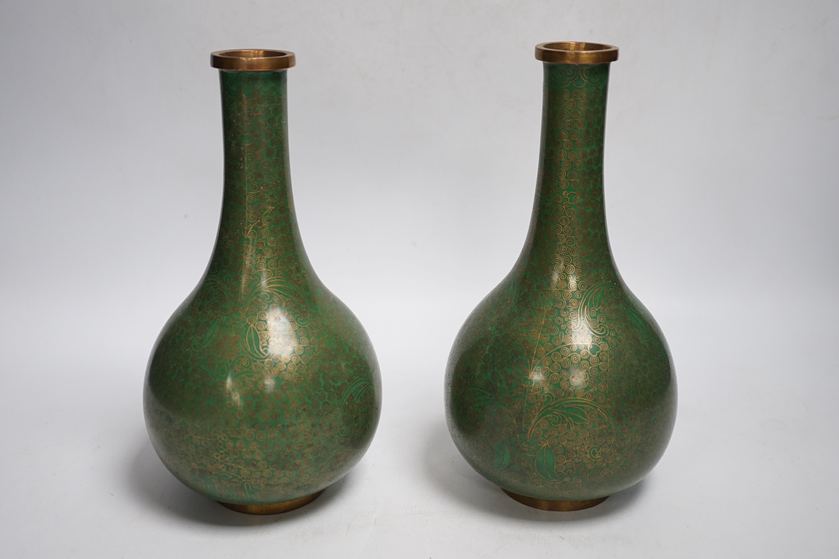 A pair of Chinese cloisonne enamel vases and a box and cover, tallest 23cm